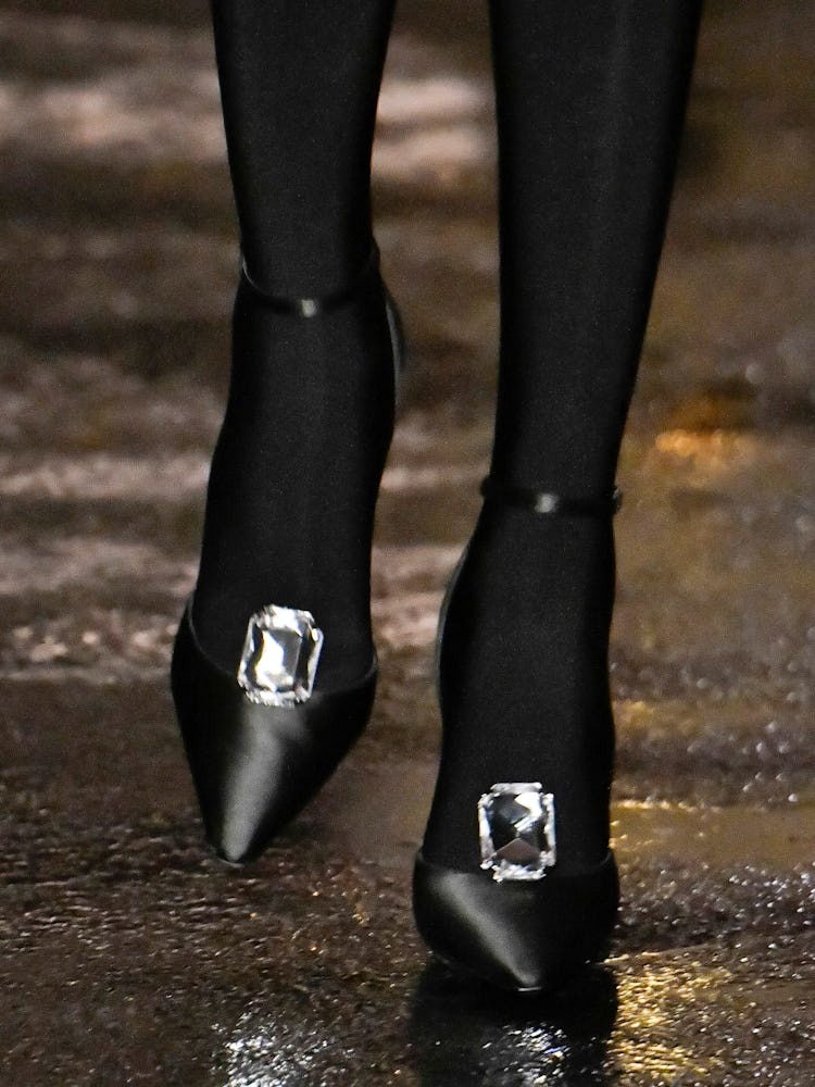 PARIS, FRANCE - FEBRUARY 27: A model walks the runway during the Saint Laurent Ready to Wear Fall/Wi...