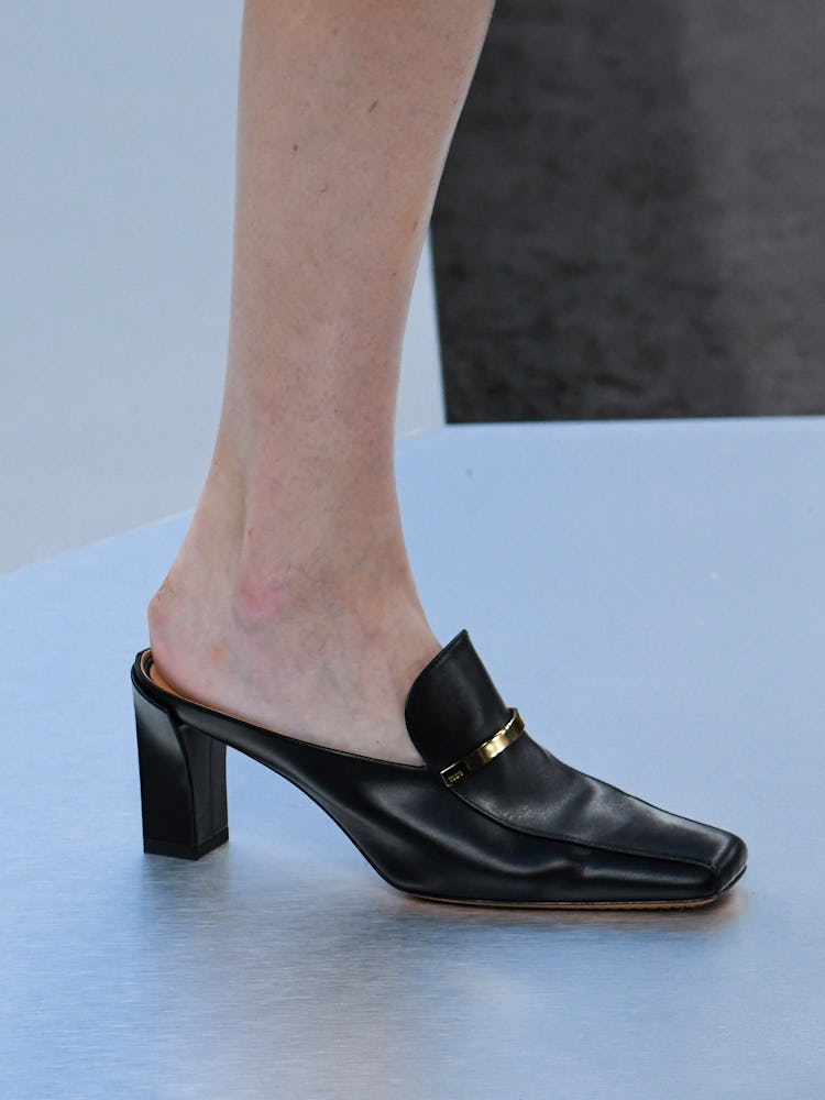 MILAN, ITALY - FEBRUARY 23: A model walks the runway during the Tods Ready to Wear Fall/Winter 2024-...