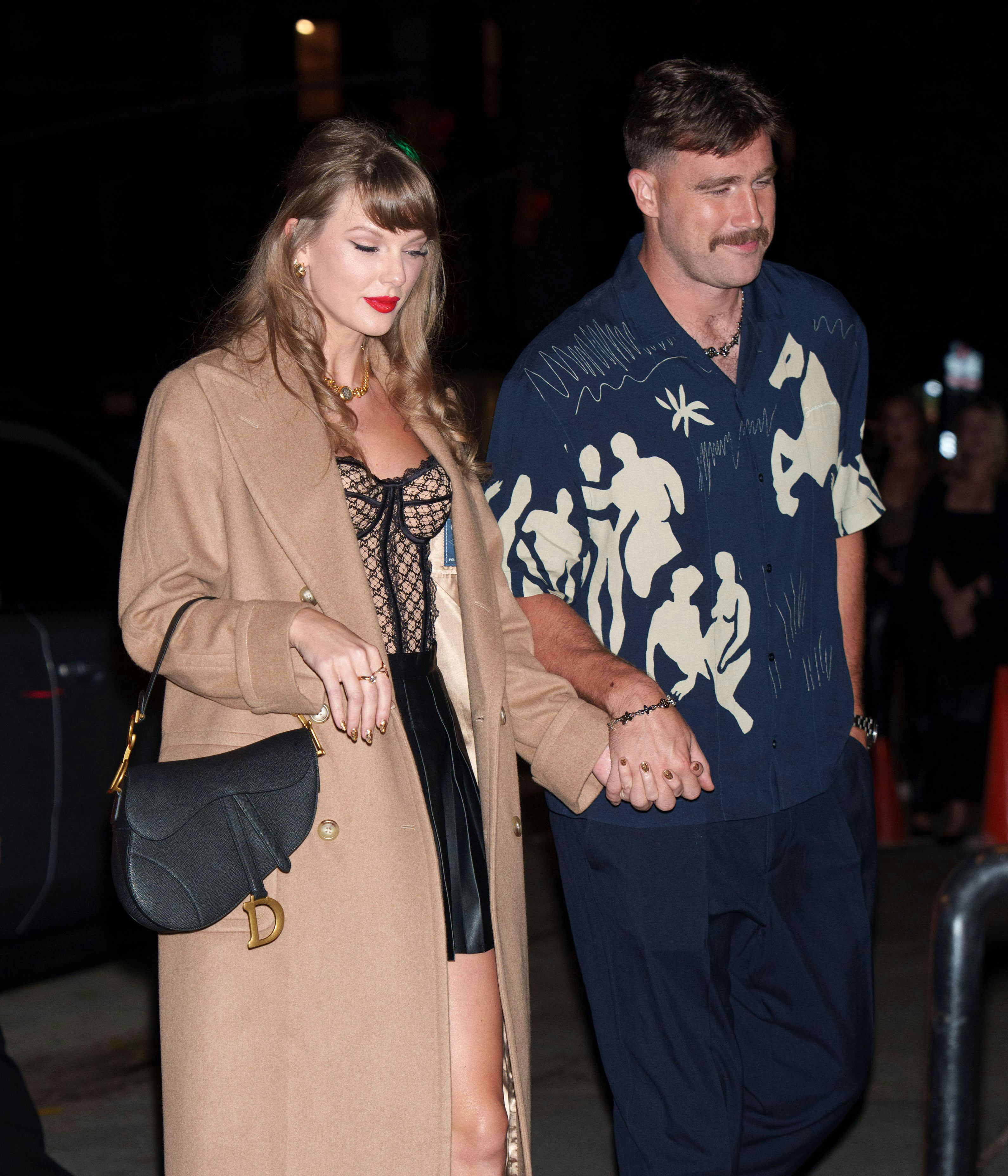 Taylor Swift and Travis Kelce are seen on October 11, 2024 in New York City.
