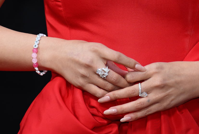 LONDON, ENGLAND - OCTOBER 11: Selena Gomez, bracelet detail, attends the “Emilia Perez” Headline Gal…