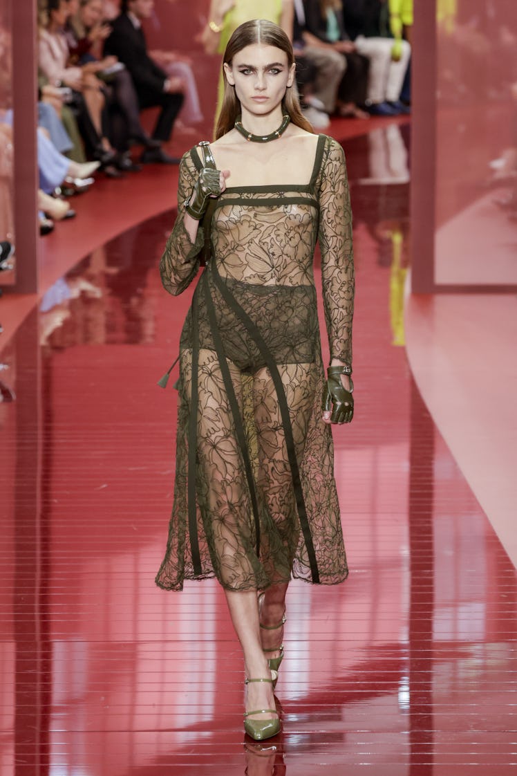 MILAN, ITALY - SEPTEMBER 20: A model walks the runway during the Gucci Ready to Wear Spring/Summer 2...