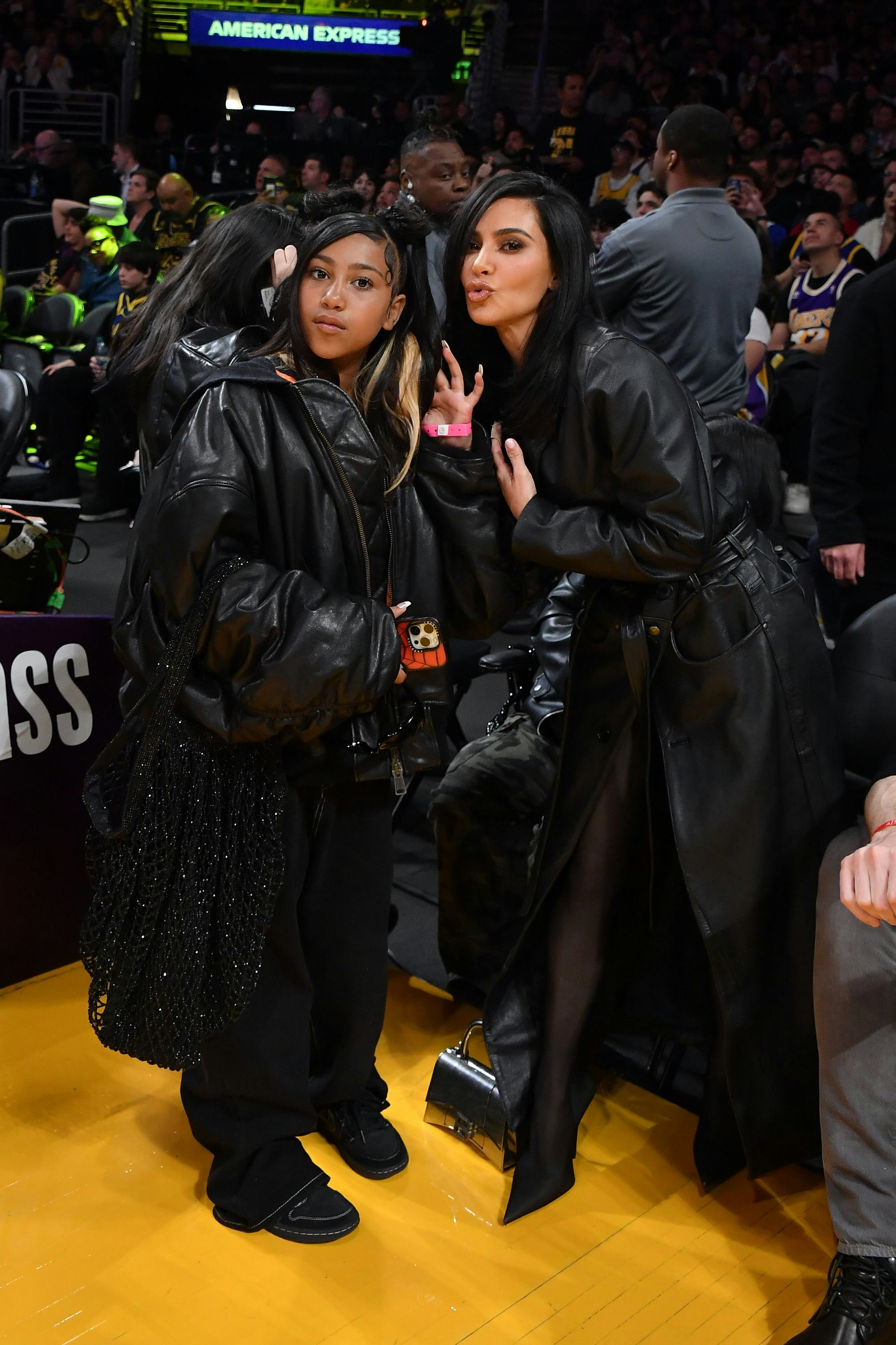 LOS ANGELES, CALIFORNIA - APRIL 09: Kim Kardashian (R) and North West attend a basketball game betwe&hellip;