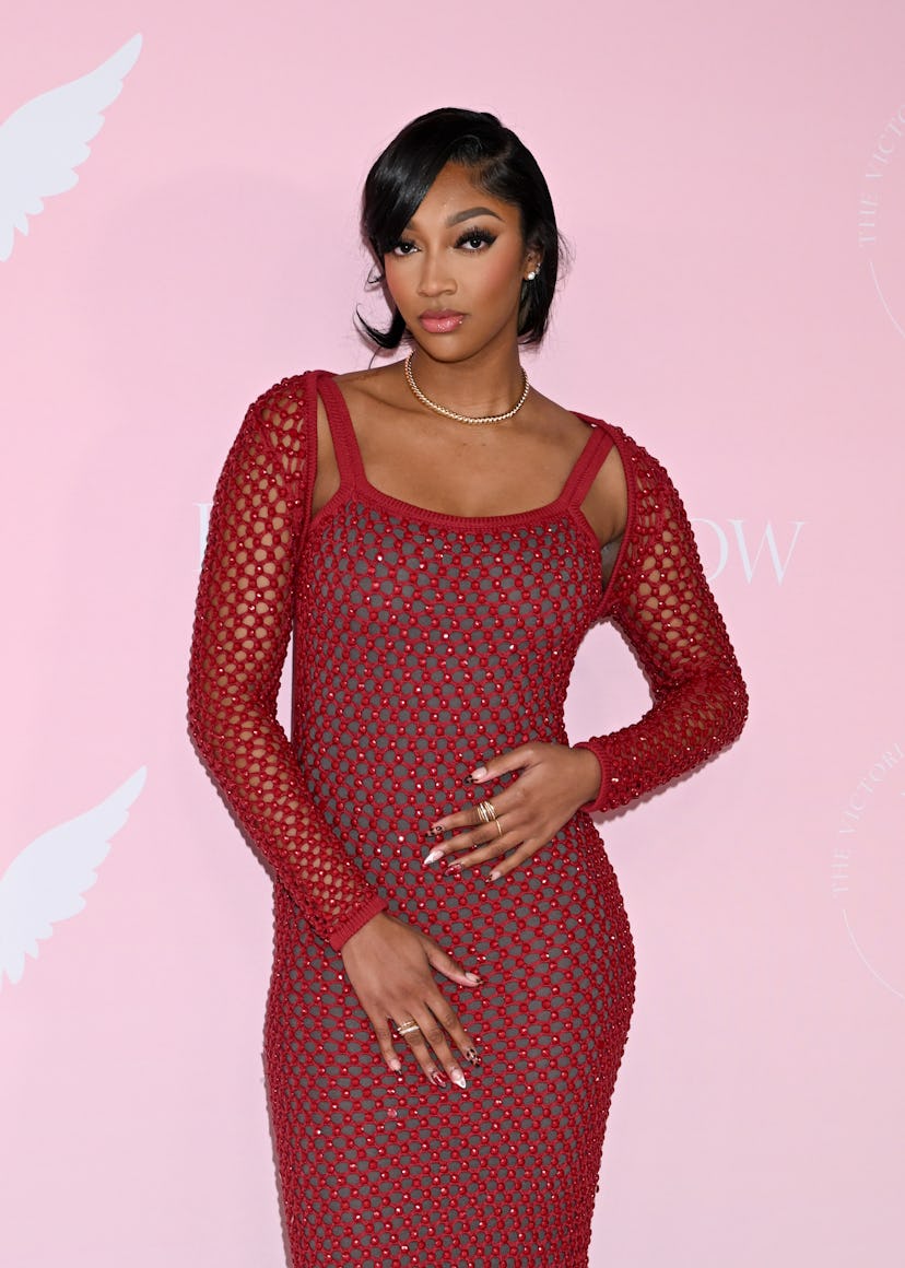 Angel Reese wore a red-hot mesh dress to the Victoria’s Secret Fashion Show.