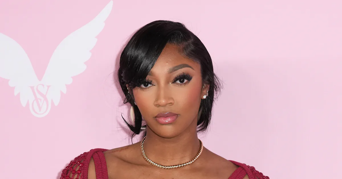 angel reese crochet dress WNBA Star Angel Reese Soars to Great Heights in Slingback Heels With Crochet Dress for Victoria's Secret Fashion Show 2024 Red Carpet