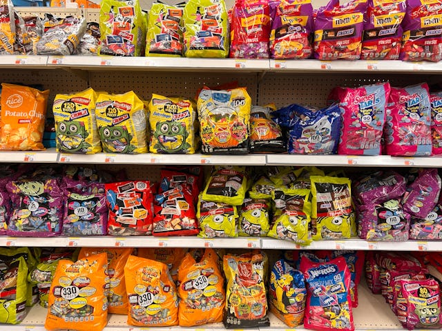 Large bags of Halloween candy for sale in Walgreens pharmacy. Chocolate and non-chocolate candy pric...
