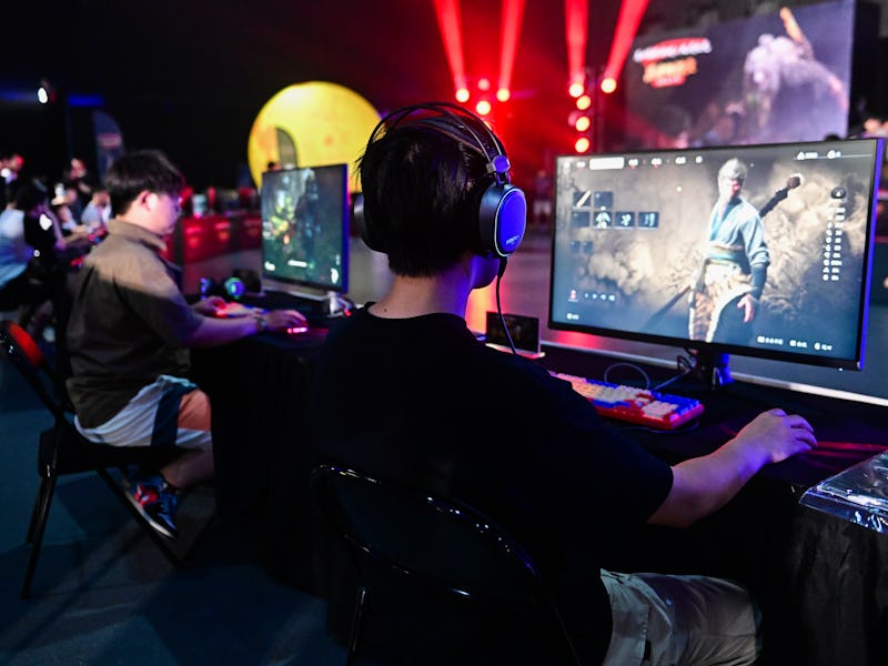 SUZHOU, CHINA - SEPTEMBER 22: Gamers play video game during "Black Myth: Wukong" ESports Carnival on...