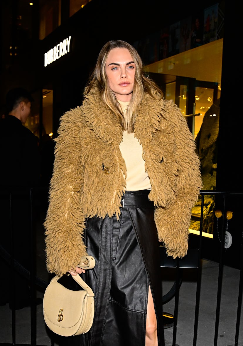 Cara Delevingne arrives at the grand reopening of The NY Burberry Flagship Store on October 16, 2024...