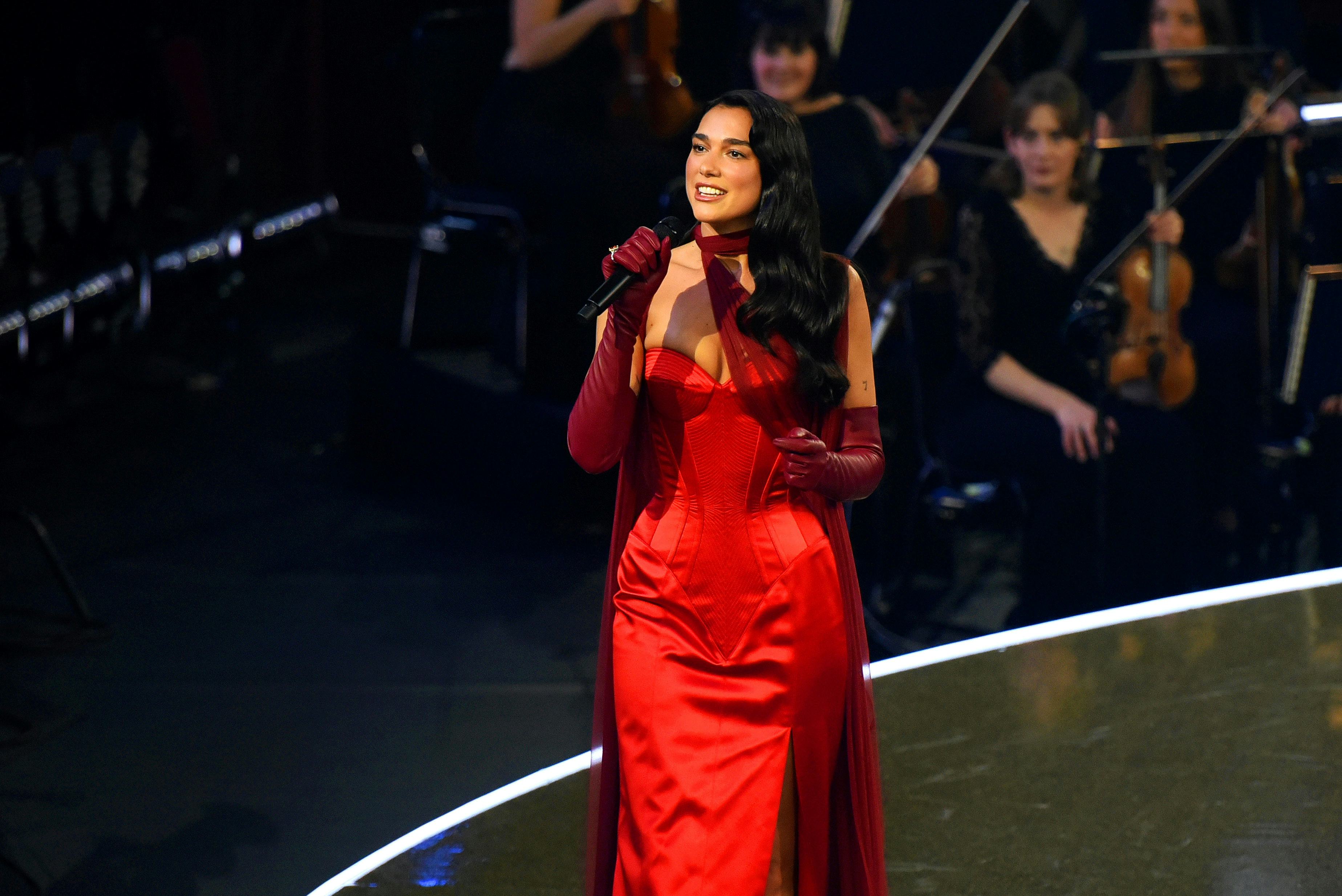Dua Lipa wore an old Hollywood-esque slit dress during a recent performance.