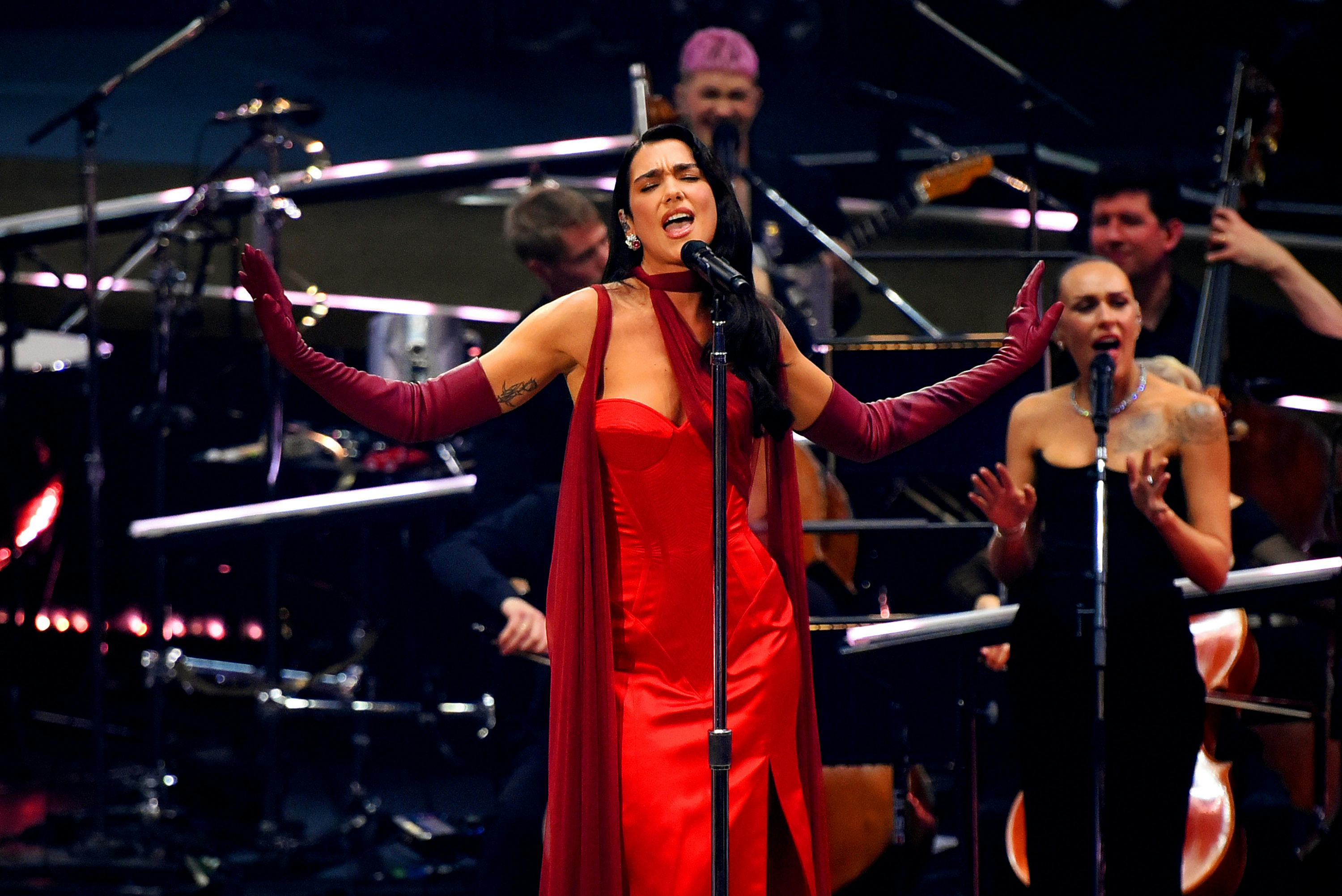 Dua Lipa wore an old Hollywood slit dress during a performance at the Royal Albert Hall.