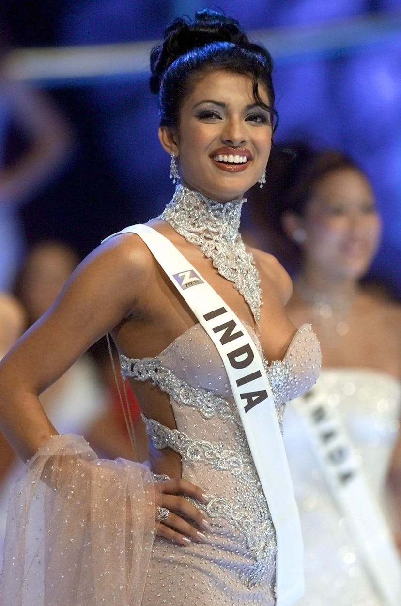 Priyanka Chopra of India poses on stage during the Miss World final at the Millenium Dome in London,...