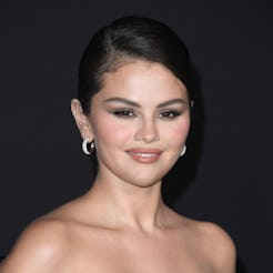 Selena Gomez added a pop of unexpected color to her all-black-everything look with her on-trend dark...