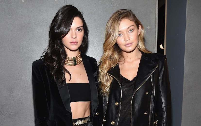 NEW YORK, NY - OCTOBER 20: Models Kendall Jenner (L) and Gigi Hadid attend the BALMAIN X H&M Collec...