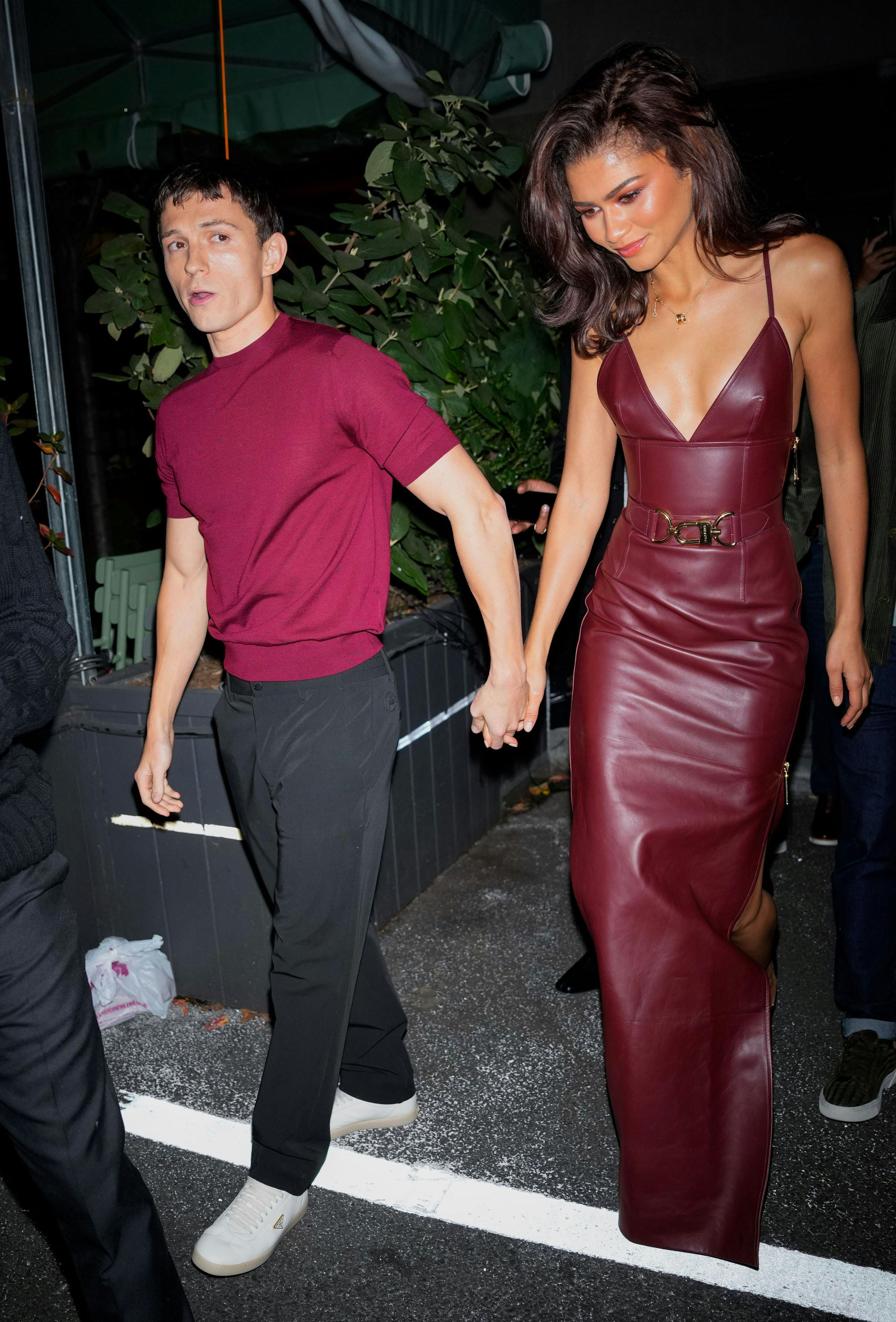 Zendaya wore a red-hot plunging number on date night with Tom Holland.