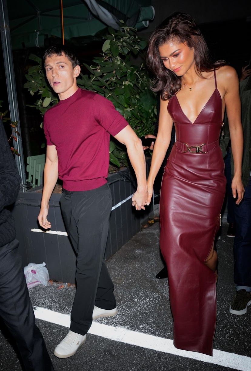 Zendaya wore a red-hot plunging number on date night with Tom Holland.