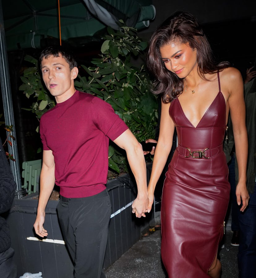 Zendaya wore a red-hot plunging dress on date night with Tom Holland.