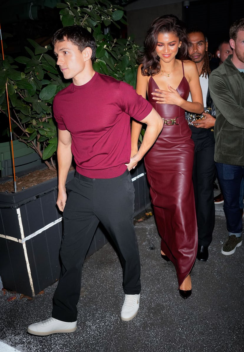 Zendaya wore a red-hot plunging dress on date with Tom Holland.