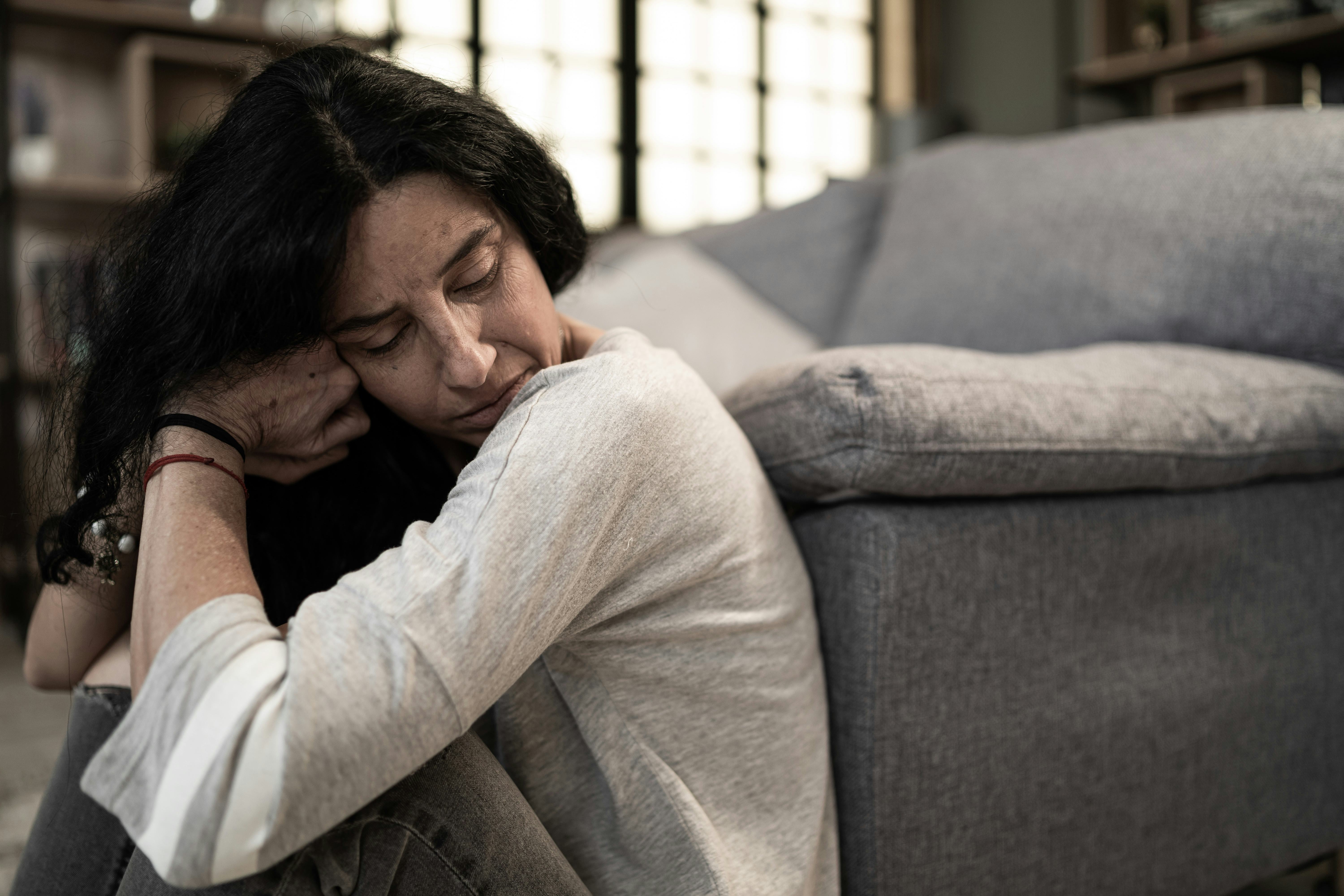 Close up of  woman struggling from mental breakdown