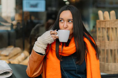 woman drinking a cup of tea