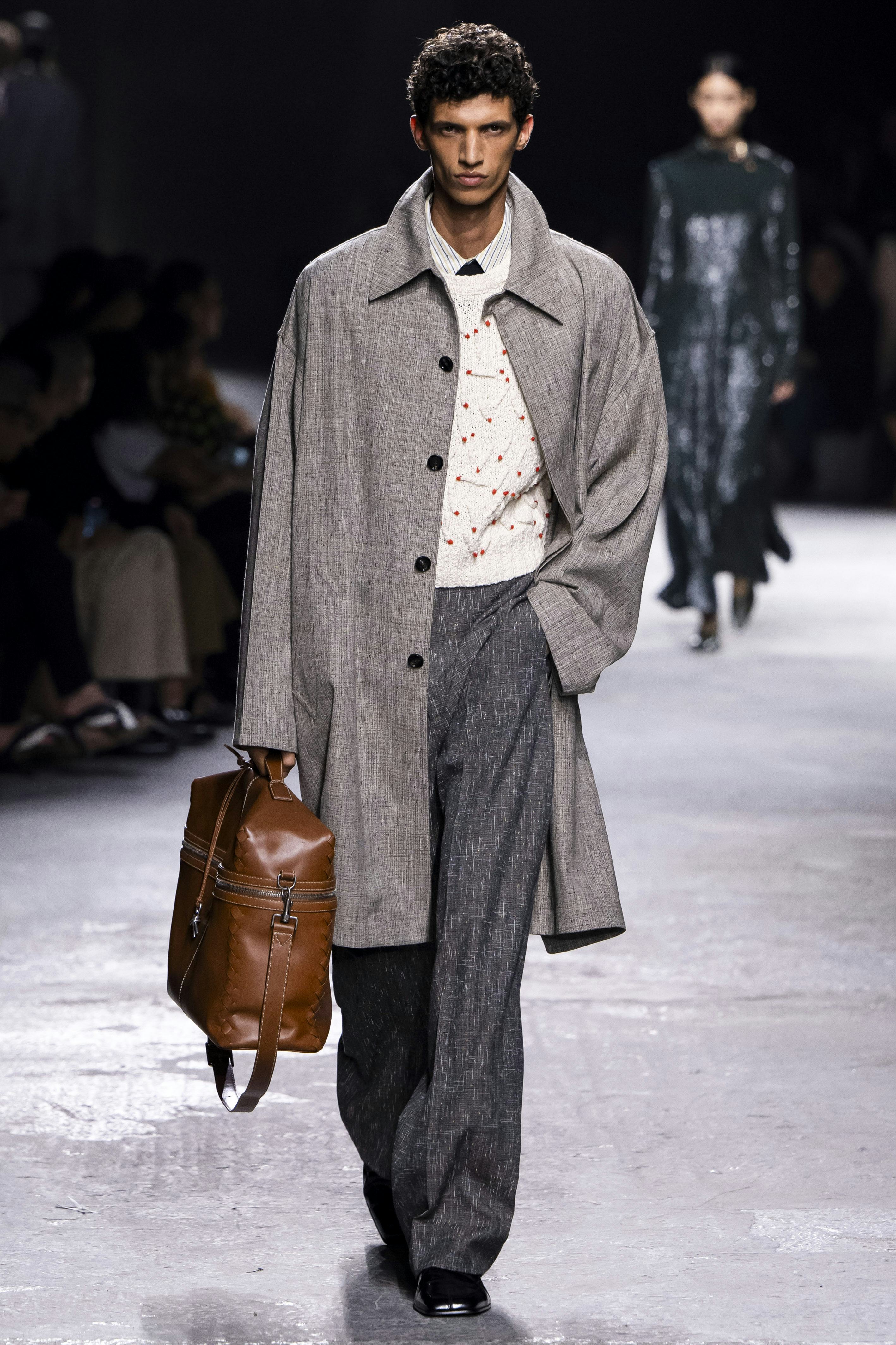 A model walks the runway during the Bottega Veneta Ready to Wear Spring/Summer 2025 fashion show as ...