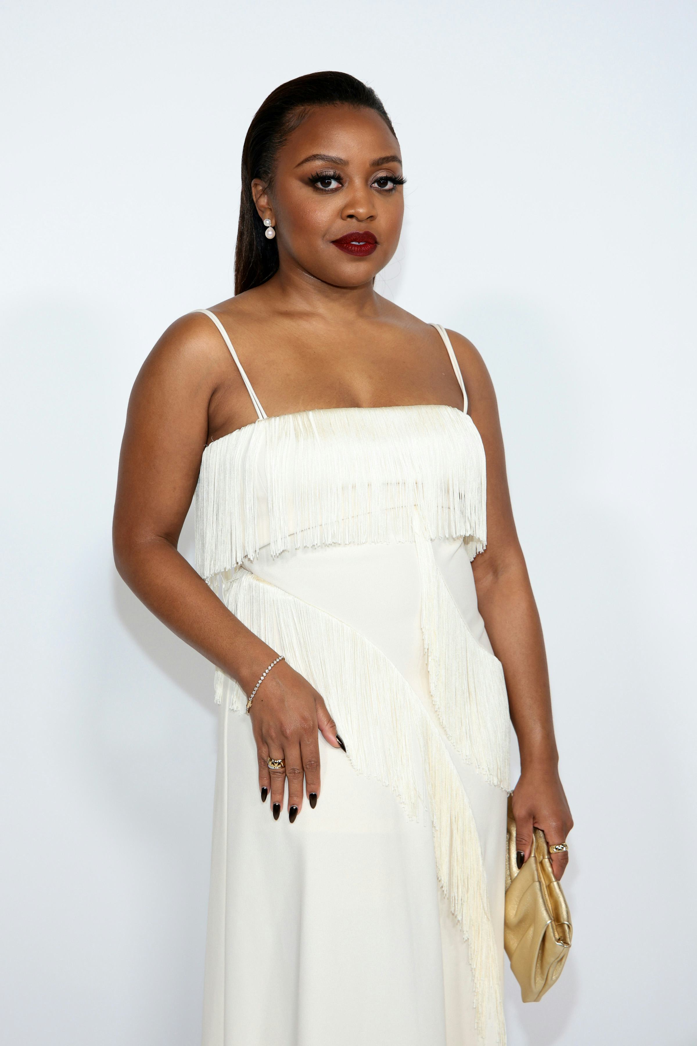 Quinta Brunson red lipstick