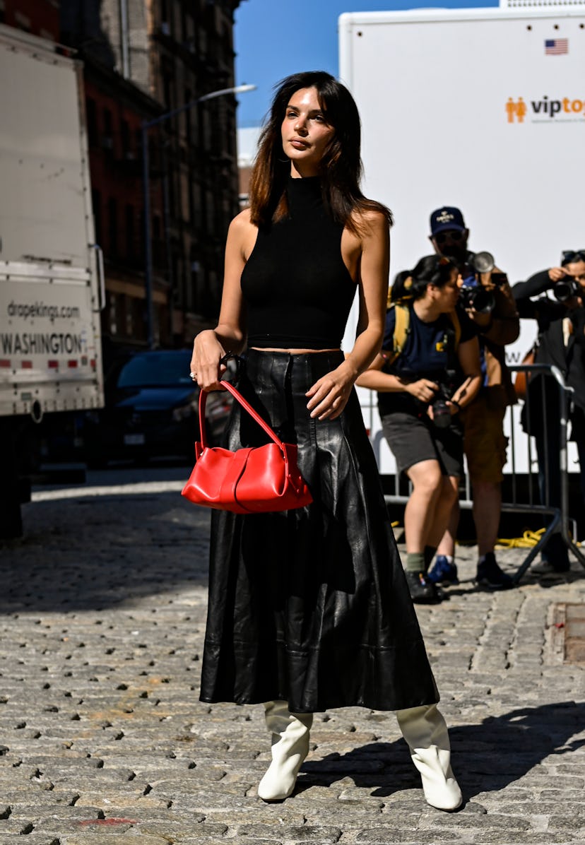 NEW YORK, NEW YORK - SEPTEMBER 04: Emily Ratajkowski is seen wearing a black sleeveless top, black l…