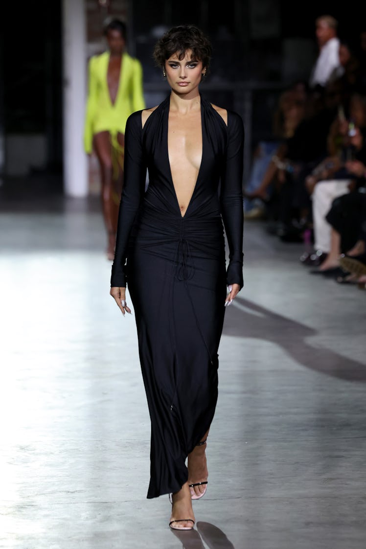 NEW YORK, NEW YORK - SEPTEMBER 09: A model walks the runway at the LaQuan Smith fashion show during ...