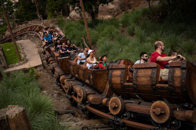 LAKE BUENA VISTA, FL - JUNE 3: Guests on the Seven Dwarfs Mine Train at Disney World's Magic Kingdom...