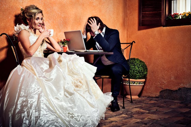 Beautiful bride drinking coffee and groom in shock seeing how much money he has spent for the weddin...