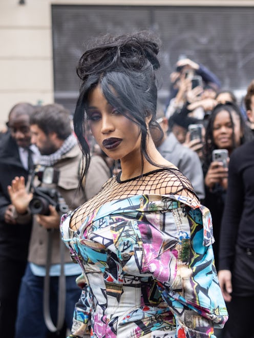 Cardi B '90s updo and black lipstick