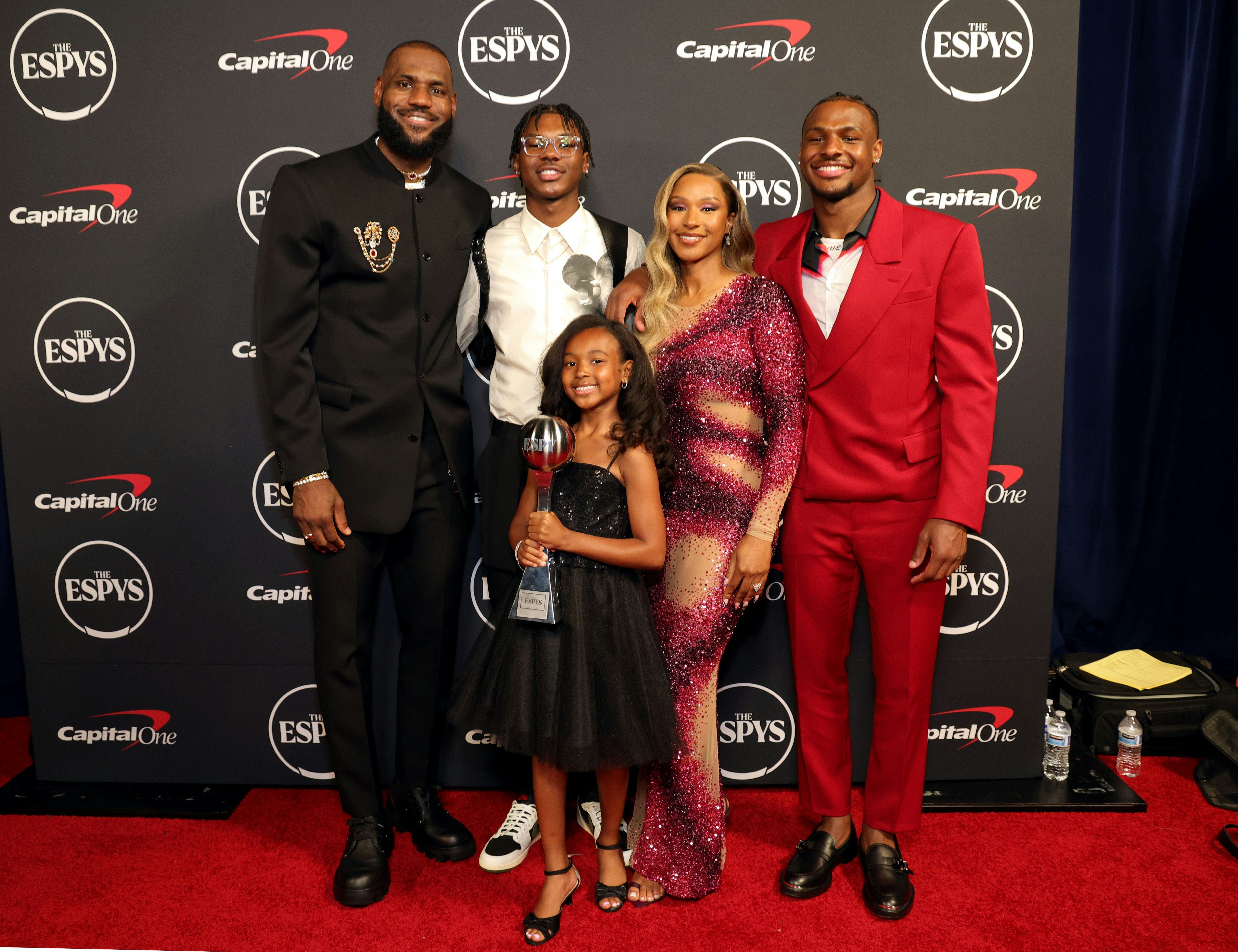 LeBron and Savannah James with their children, Bryce James, Zhuri James, and Bronny James.