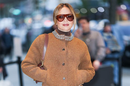 Jennifer Lopez wore a winter-ready turtleneck dress with a naked twist.