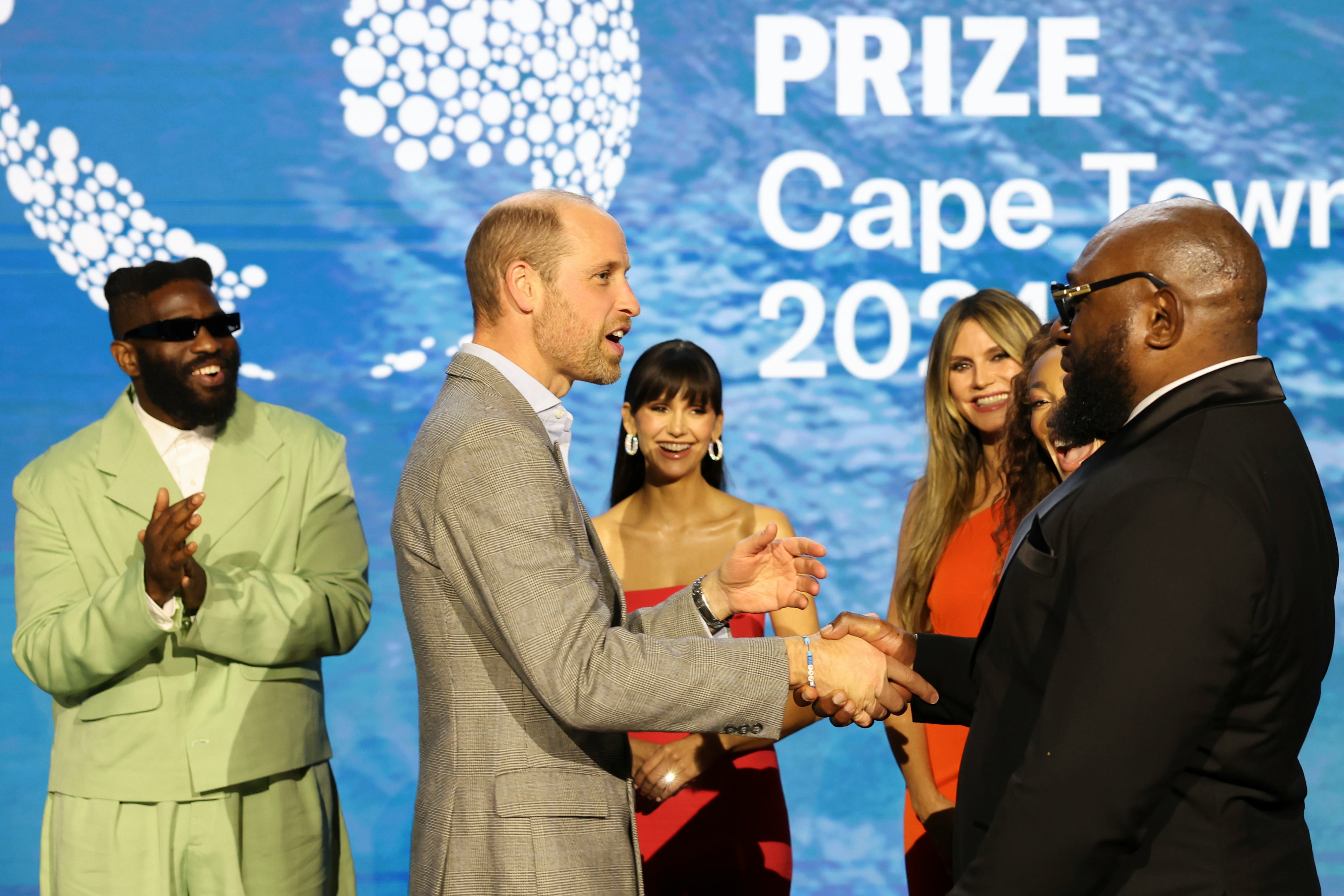 Prince William, Prince of Wales poses with performers and presenters during the 2024 Earthshot Prize&hellip;
