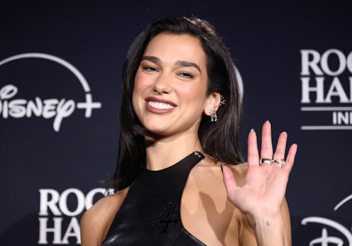 Dua Lipa's leather midi skirt is fall perfection.