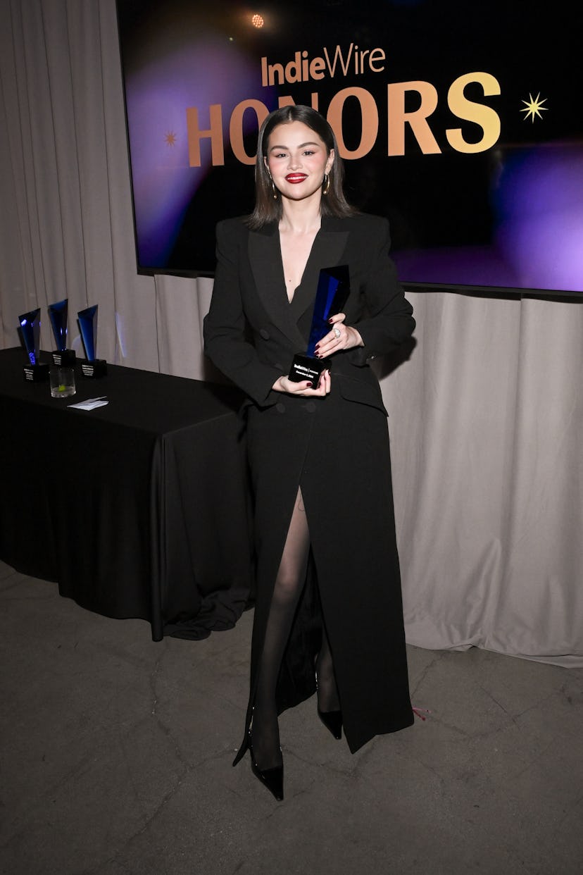 Selena Gomez poses with the Spotlight Award for “Emilia Perez” at the IndieWire Honors 2024 held at …