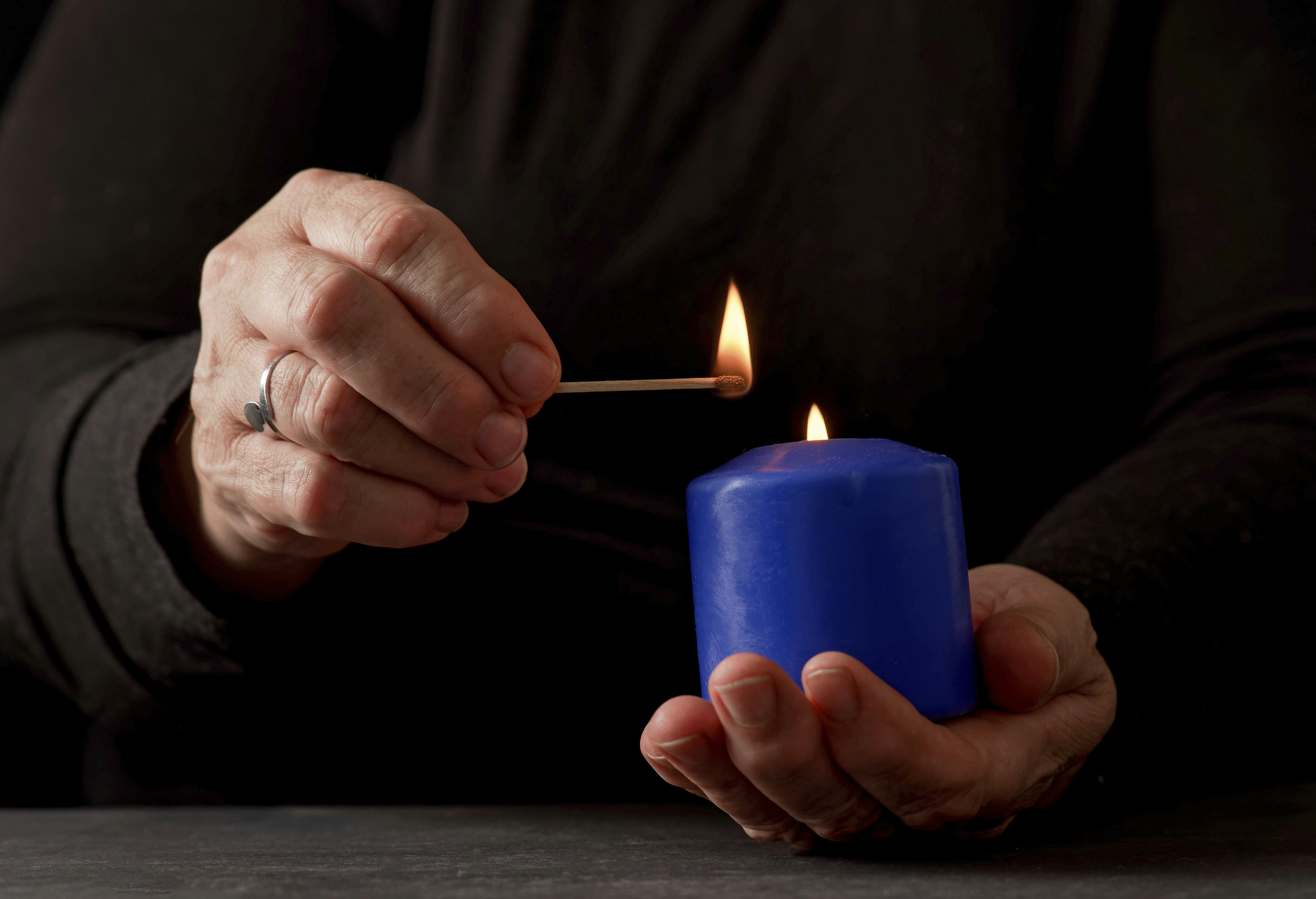 Use a blue candle to manifest during the Dec. 15 full moon.