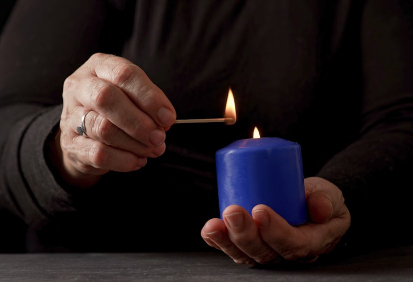 Use a blue candle to manifest during the Dec. 15 full moon.
