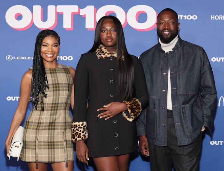 HOLLYWOOD, CALIFORNIA - DECEMBER 11: (L-R) Gabrielle Union, Zaya Wade and Dwyane Wade attend the Out...