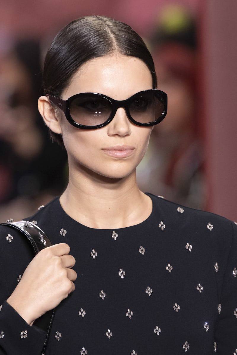 MILAN, ITALY - SEPTEMBER 20: A model walks the runway during the Gucci Ready to Wear Spring/Summer 2...
