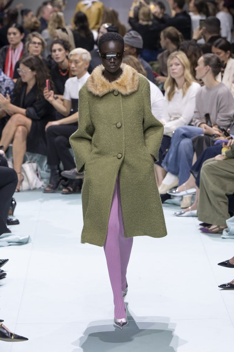 MILAN, ITALY - SEPTEMBER 19: A model walks the runway during the Prada Ready to Wear Spring Summer 2...