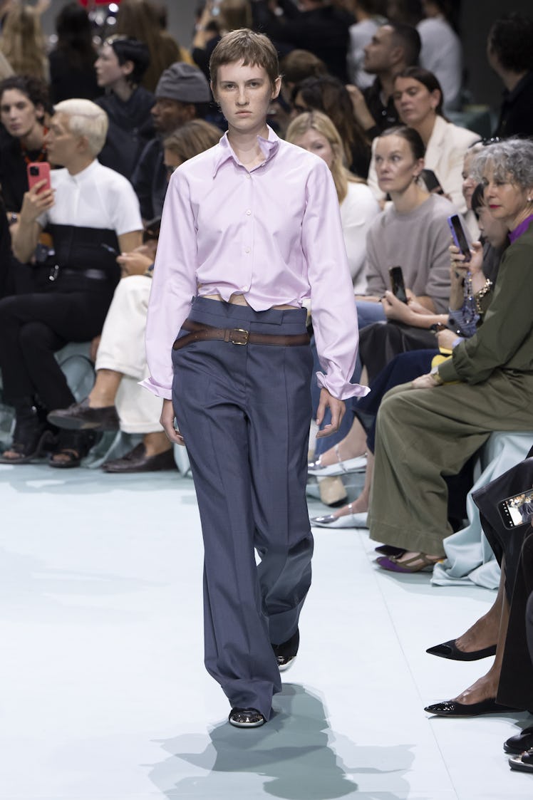 MILAN, ITALY - SEPTEMBER 19: A model walks the runway during the Prada Ready to Wear Spring Summer 2...