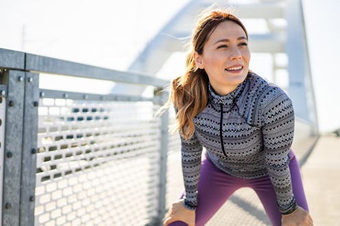 Shot of a beautiful young woman relaxing after running workout.