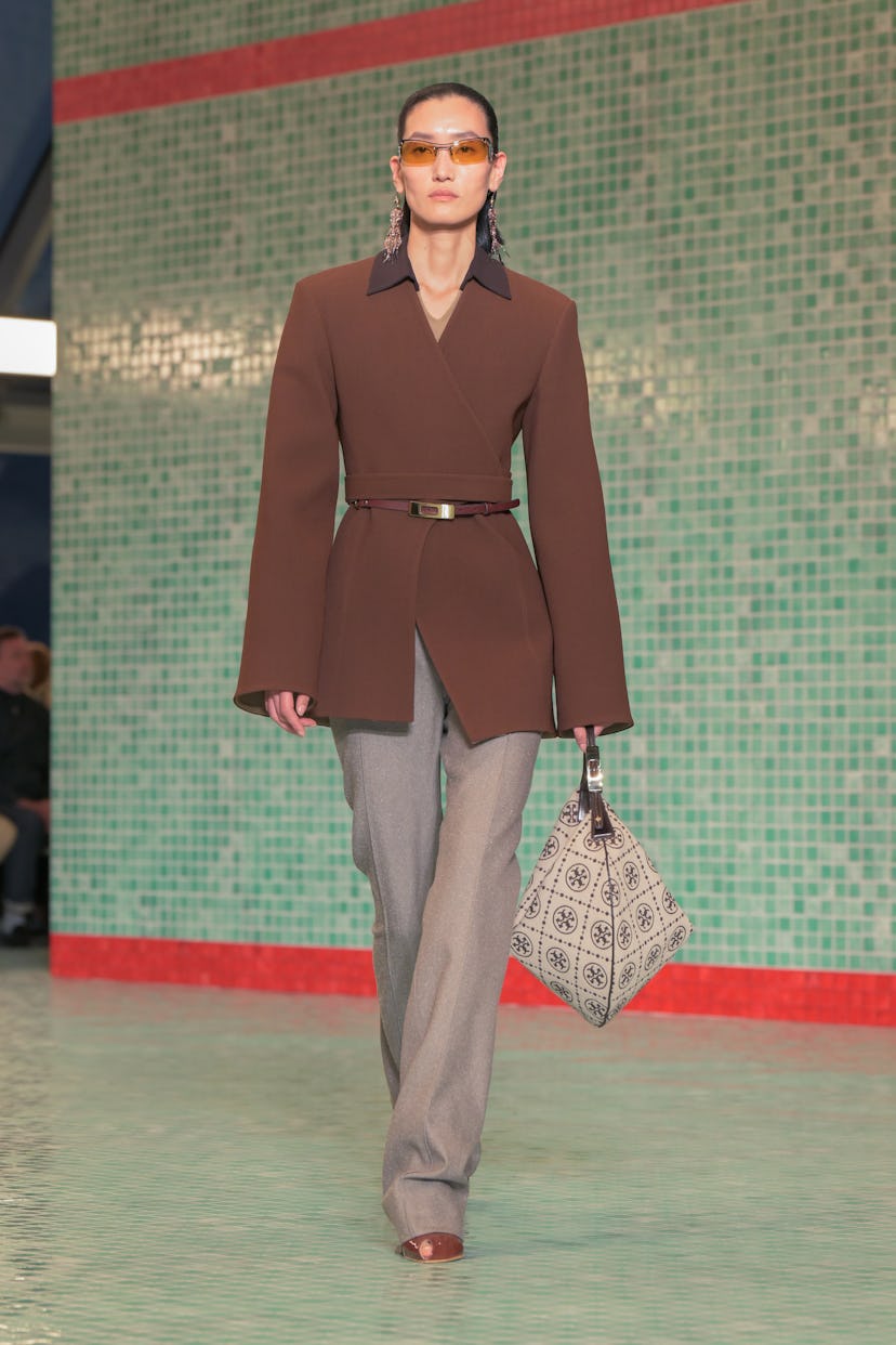 Model on the runway at Tory Burch RTW Spring 2025 held at Skylight at The Refinery as part of New Yo...