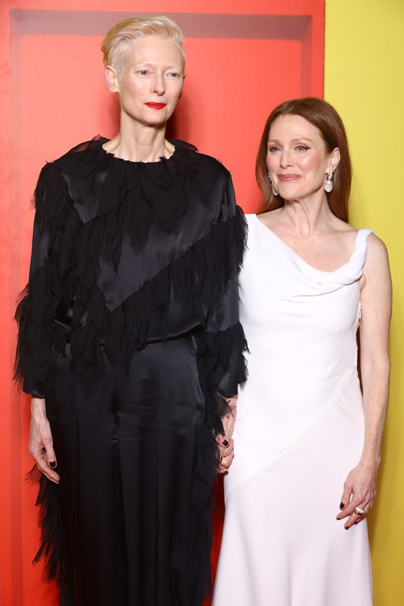 PARIS, FRANCE - DECEMBER 16: Tilda Swinton and Julianne Moore attend the "The Room Next Door" Premie...
