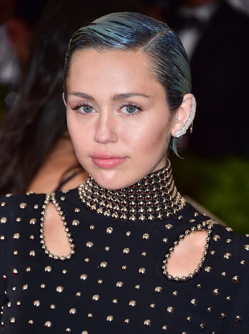 Miley Cyrus slicked-back blue glitter hair