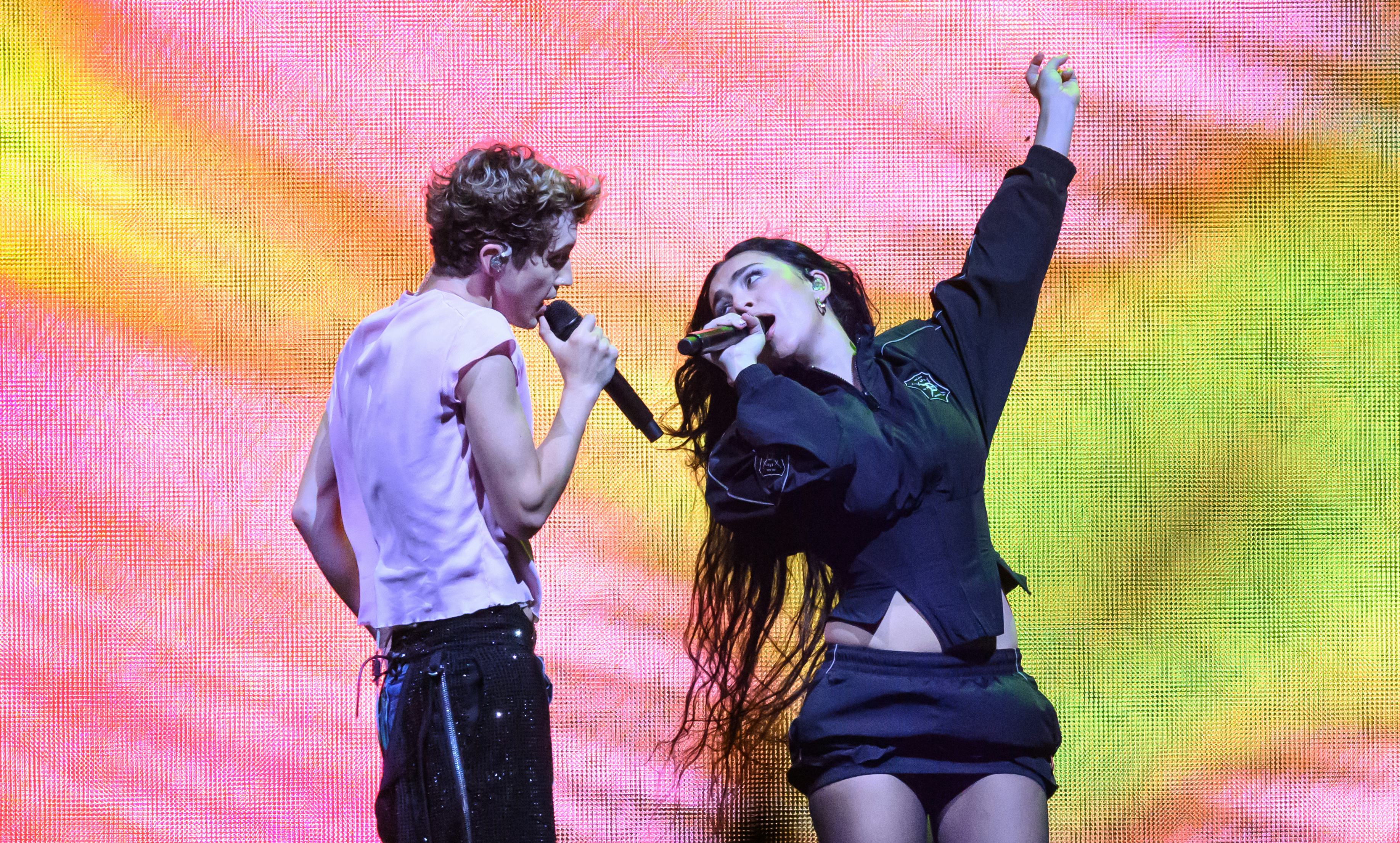 LONDON, ENGLAND - JUNE 27: Charli XCX joins Troye Sivan on stage during the Something to Give Each O&hellip;