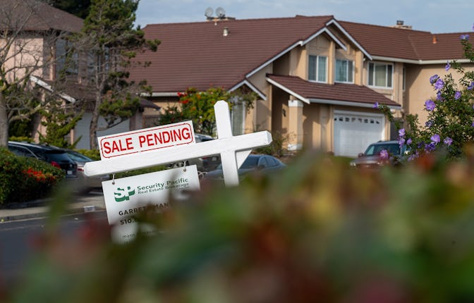 A "Sale Pending" sign in front of a home in Pinole, California, US, on Tuesday, Dec. 26, 2023. Sales...
