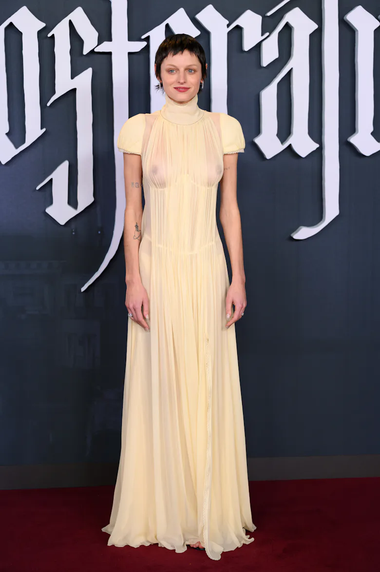 emma corrin dress Corrin's Sheer Tulle Gown Is From A Burgeoning London Designer Emma Corrin wears goldfish bag