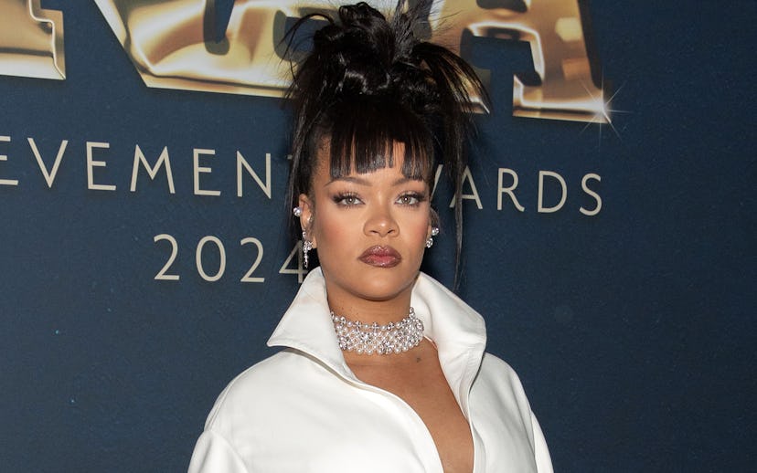 NEW YORK, NEW YORK - DECEMBER 04: Rihanna attends the 38th Annual Footwear News Achievement Awards a...