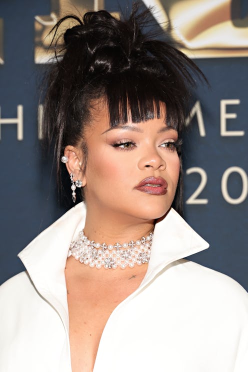 Rihanna wore a plunging Alaïa dress to the Footwear News Achievement Awards.