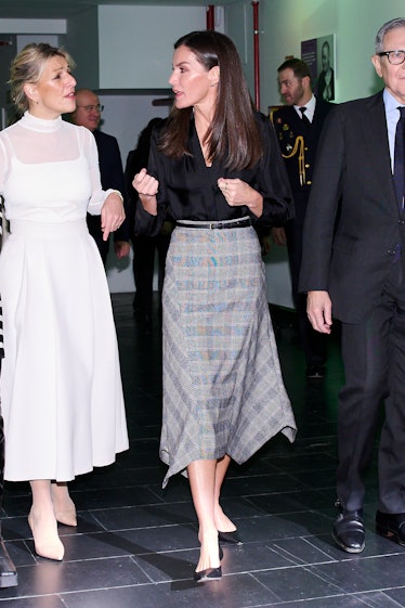 Minister of Labour and Social Economy Yolanda Díaz (L) and Queen Letizia of Spain (R) attend an even...
